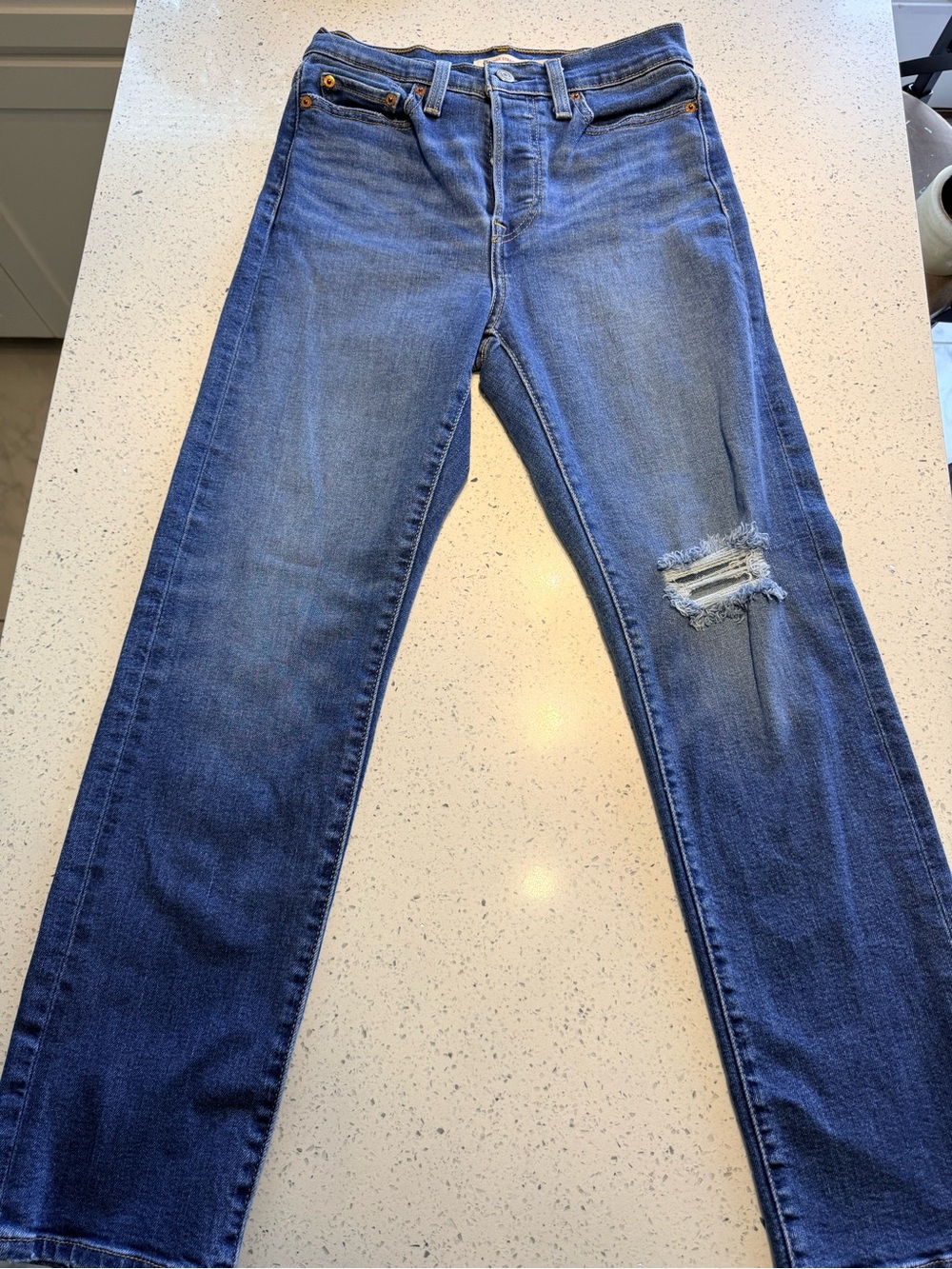 Levi's High-Rise Blue Straight Jeans with Knee Rip